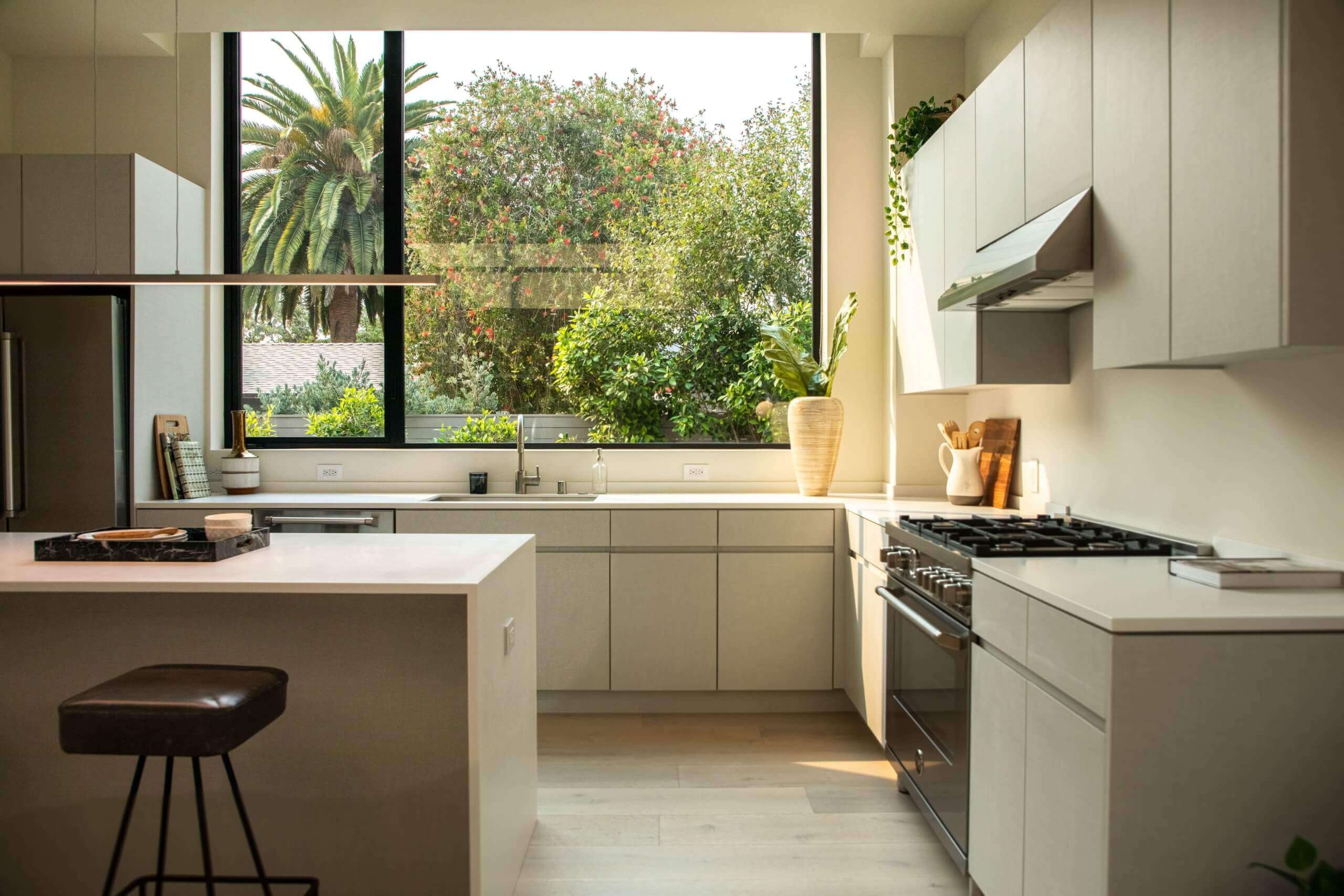 A kitchen remodel that consists of a kitchen island and matching cabinets.